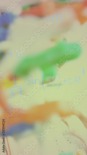 Animation of mathematical equations over caucasian children with model in lab