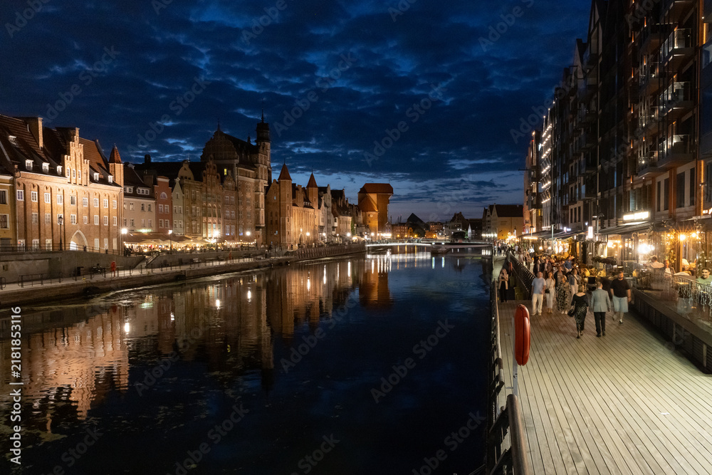 Fototapeta premium Night view of Gdansk Old Town waterfront embankment on Motlawa river in Poland.