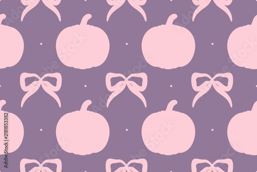 Cute seamless pattern with pink pumpkin silhouettes and bows on a purple background