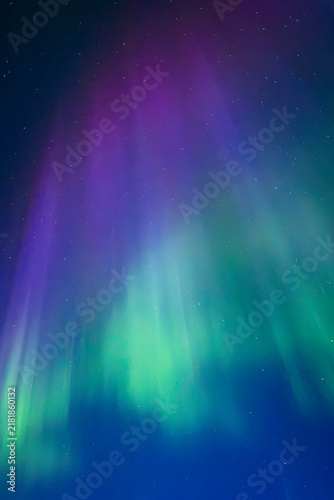Amazing aurora borealis in the starry sky in north of Sweden.