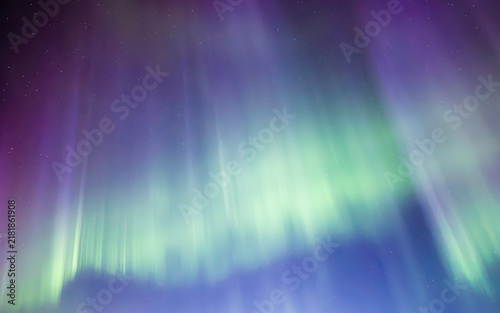 Amazing aurora borealis in the starry sky in north of Sweden.
