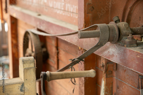 Obraz na plátne Close-up of the connected part of the belt drive on an old threshing machine