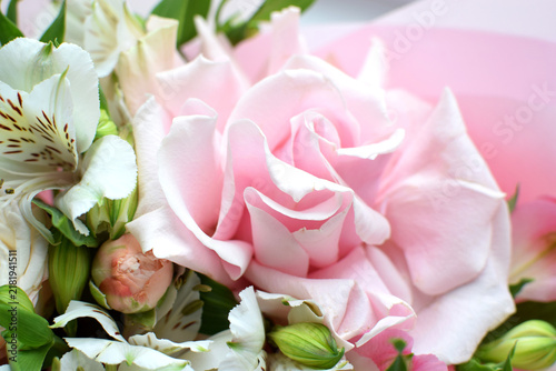 A delicate pink rose turned inside out. Wedding bouquet, floral card. Selective focus, shallow depth of field.