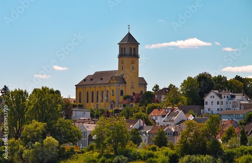Obraz na płótnie Mainz, Rhineland Palatinate, Germany – Catholic Church Maria Himmelfahrt rising above residential neighborhood surrounded by green trees