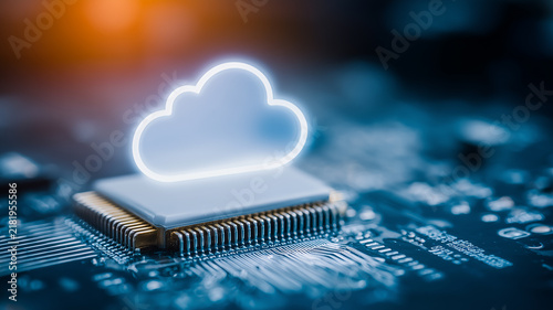 Cloud symbol positioned above a computer chip representing cloud computing infrastructure and connected data processing technology
