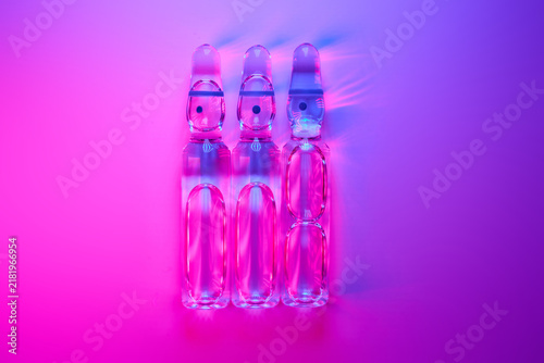 Bild auf Leinwand Ampoules representing weight loss innovation and medical research