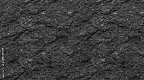 Seamless dark gray stone texture background