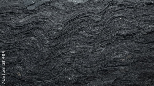 Dark grey textured stone rock background seamless pattern