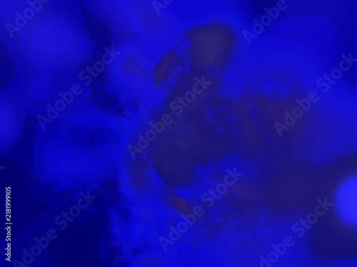 Abstract out of focus blurred background in deep dark blue and navy tones with soft light bokeh effects