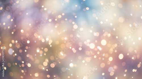 Colorful sparkles and dots on dark background