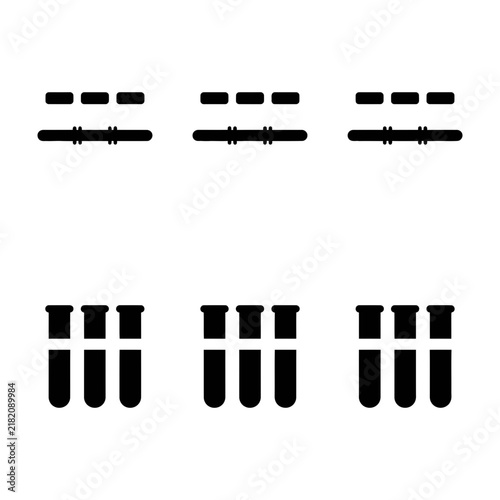 Фотография Black laboratory test tubes and equipment