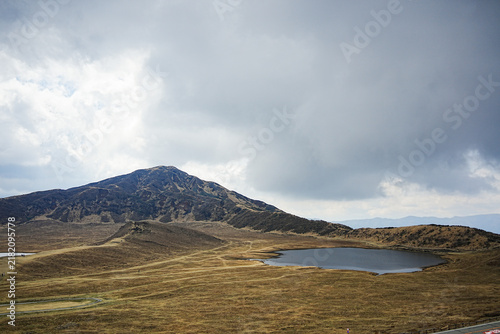 Mountain and Pond at Kusasenri Grassland in Aso, Kumamoto, Japan