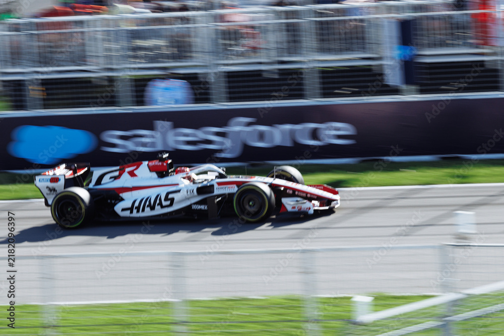 Obraz premium May 24, 2026, Montreal, Canada, Esteban Ocon races a Haas F1 car at Circuit Gilles-Villeneuve. g.