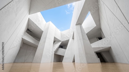 Abstract modern architecture featuring white concrete geometric structures and sharp angles, low angle view looking up at sky through building opening, minimalist design aesthetic