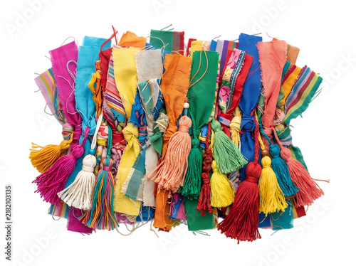 Colorful tassels made of fabric strips and yarn isolated on transparent background