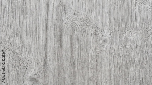 Light gray wooden background texture with natural timber grain and knots