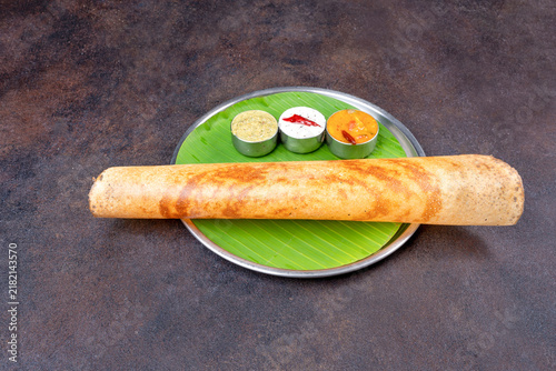 Konstfotografi Traditional South Indian dosa with colorful chutneys