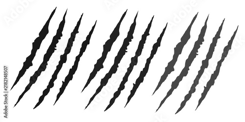 Foto Abstract claw scratch marks form repeating rows with bold distressed texture