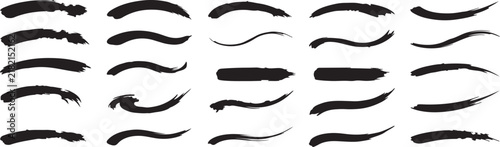 Collection of hand drawn ink brush strokes and curved lines isolated on a white background