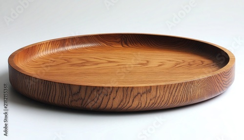 Wooden plate with natural wood grain on a white seamless background. Use it to showcase food or highlight natural material designs.