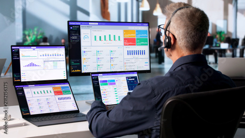 Bild auf Leinwand Call Center Agent Monitors Customer Support Dashboard