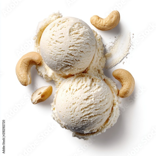 Cashew nut ice cream scoops with cashew halves isolated on a white background