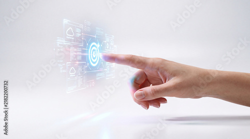 Hand interacting with a digital target interface for strategic business planning and professional development success