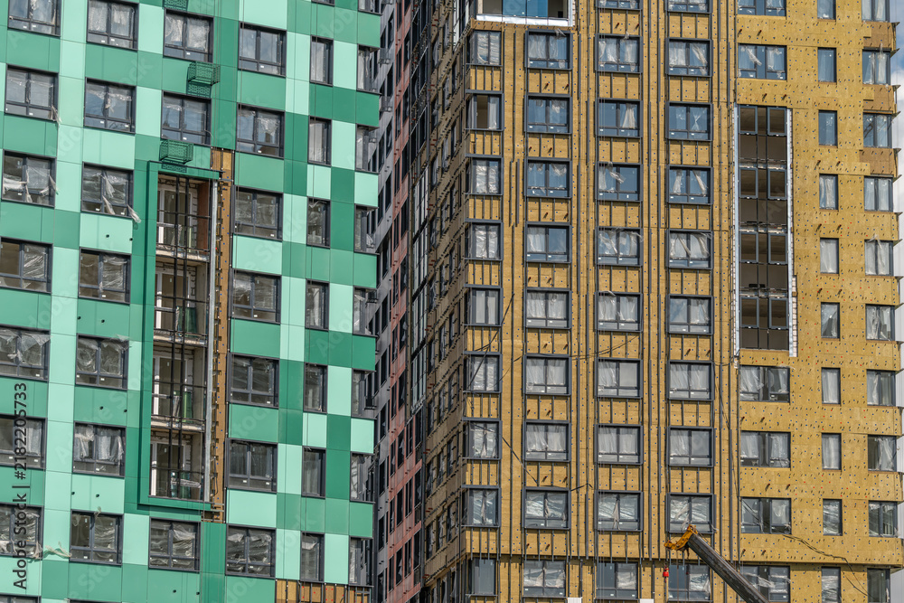 Fototapeta premium Modern architecture blends with color and form in a bustling urban construction site