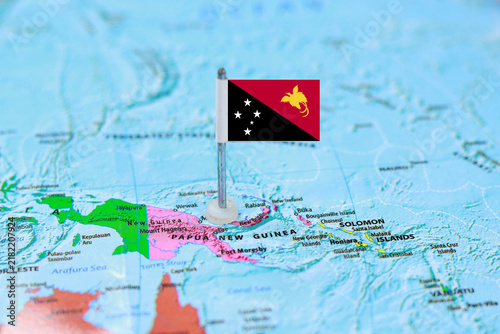 Papua New Guinea Flag Pin Pinned on World Map Travel Concept