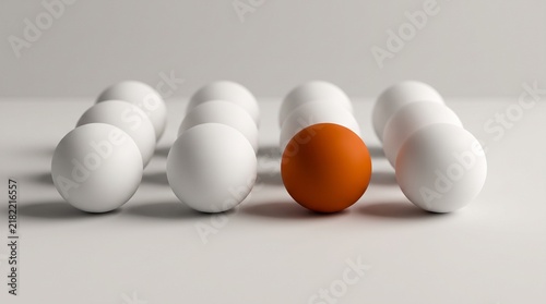Stand out from the crowd concept with a single different orange ball among many white ones