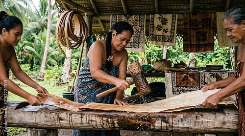 Pacific islander women making traditional tapa bark cloth