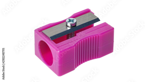 Fotografie Bright pink plastic pencil sharpener with metal blade, isolated on transparent b