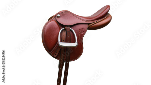 Canvastavla Brown leather equestrian saddle with metal stirrups, isolated on transparent bac
