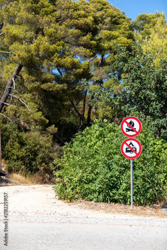 Road signs prohibiting open fires and camping.