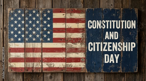 Rustic wooden sign celebrating constitution and citizenship day with american flag design on old weathered barn wood