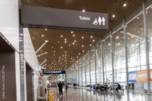Washroom or toilet signages at airport terminal before boarding air plane for travelers convenience