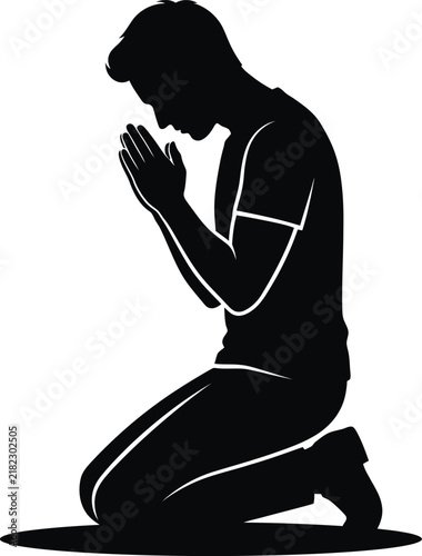 Silhouette of a Man Kneeling and Praying with Folded Hands