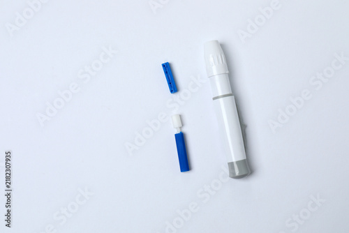 Принти на полотні Blood glucose meter with lancets, top view