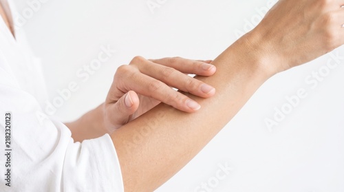 of woman applying moisturizing cream or lotion to arm, skincare routine, beauty and wellness, healthy hydrated skin texture, self care ritual, dermatology treatment