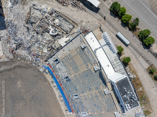 Orchard Park, New York, United States - 19 July 2026: Aerial view of the demolition of the former Highmark Stadium, showing debris and structural remains of the seating area in the east end zone.