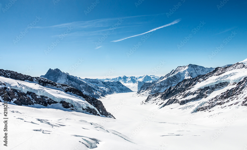 Obraz premium Landscape of Snow capped mountains at Jungfrau peaks. Top of europe at mount Alps, Switzerland.