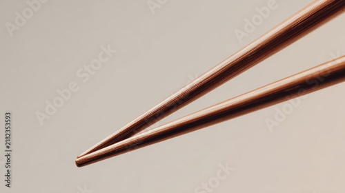 close-up chopsticks crossing each other