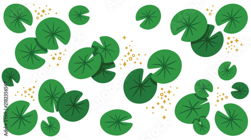 Numerous green lily pads floating on water with sparkling gold accents.