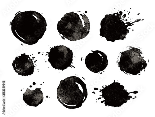 Black ink splatter and watercolor brush stroke collection. Hand drawn round textured circles, distressed paint splashes and grunge stains for artistic graphic design, posters and branding elements