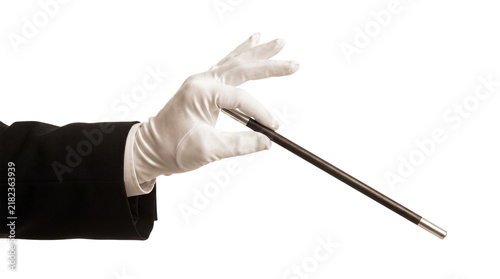 Foto Magician Hand in White Glove Holding Magic Wand Isolated on Black Background, Il