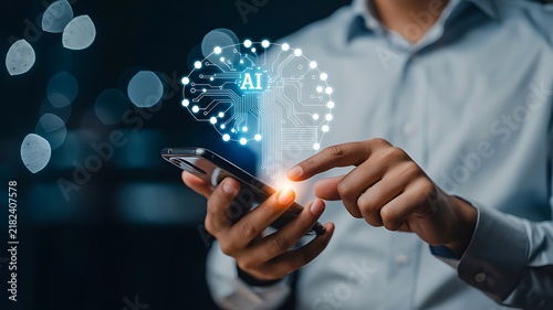 Businessman using mobile phone with futuristic artificial intelligence brain graphic symbol for smart technology innovation