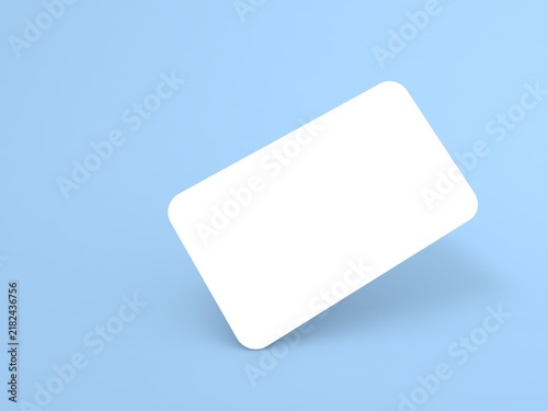 Blank white card on a light blue background at a slight angle showing a clean surface for creativity