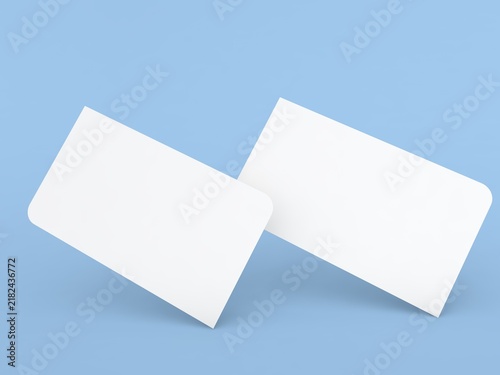 Blank white cards on a blue background used for various purposes like notes, invitations, or creative projects
