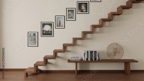 Modern staircase leading to bookshelf with framed pictures on wall