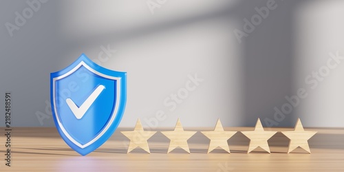 Five wooden stars on table with blue shield in front on grey wall background, secure, safe or trusted rating concept